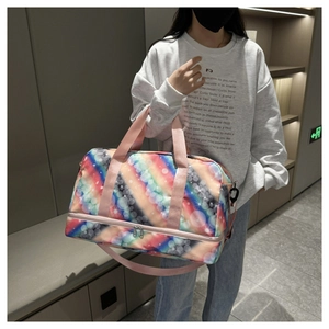 Rainbow travel bag with pink handles featuring a separate bottom wet-dry compartment