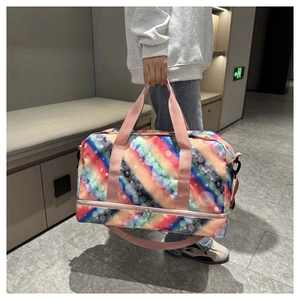 Detail of travel bag with rainbow star patterns and separate bottom shoe compartment