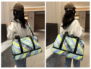 Detail of travel bag with bottom shoe compartment and colorful abstract print patterns