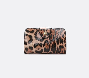 Detail of leopard print card holder in glossy finish with gold snap closure