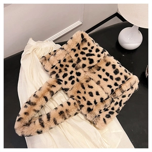 Close-up of the plush leopard print tote bag with a soft faux fur texture and sturdy handle