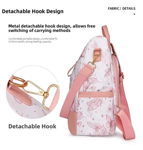 Detail of the detachable golden metal hook on the pink butterfly print backpack