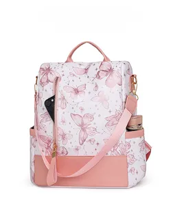 Detail of butterfly print backpack showing front zipper pocket and side water bottle holder