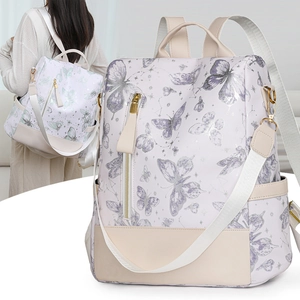 Minimalist white backpack with lavender butterfly print and beige leather details