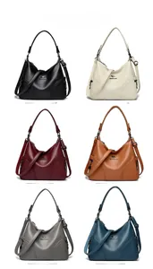Litchi pattern leather handbags in six colors with adjustable straps and kangaroo logo