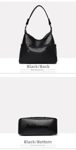 Detail view of black litchi pattern leather shoulder bag with back zipper and embossed base