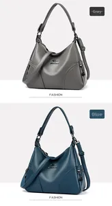 Detail view of large crossbody bag featuring pebble leather texture and metal hardware