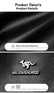 Detail of black litchi grain leather texture and silver metallic BALIDAISHUROO logo