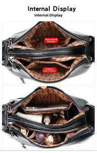 Internal view of the large capacity crossbody bag with multiple compartments and pockets