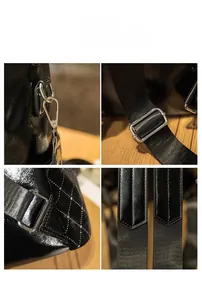 Detail view of the black glossy backpack showing silver metal hooks and diamond stitching