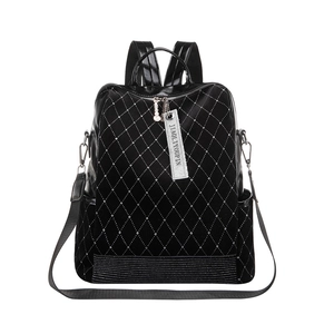 Fashionable black faux leather backpack for women featuring rhinestone diamond patterns