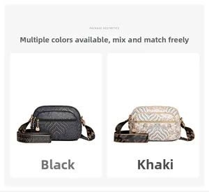 Detail shot of vintage pattern crossbody bags in black and khaki with logo straps