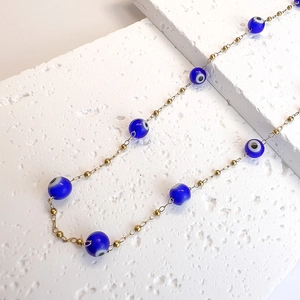 Collier minimaliste en acier inoxydable plaqué or 18K avec perles œil bleu et accents dorés