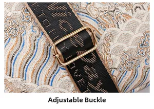 Close-up of adjustable metal buckle on a retro patterned shoulder bag with woven strap