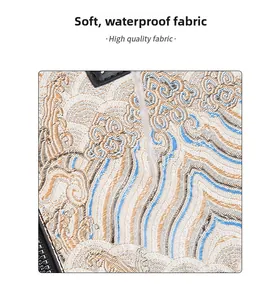 Detail showing high quality waterproof fabric with traditional Chinese cloud embroidery