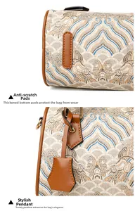 Detail of large tote bag showing anti-wear bottom studs and elegant leather pendant