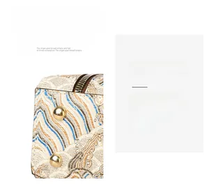 Detail of bag bottom with protective gold studs and wave pattern fabric texture