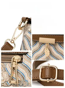 Detail of vintage wave pattern jacquard fabric and premium gold-tone hardware buckles