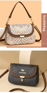 Detail view of ethnic flap square bags with metallic leaf pendant and brand logo