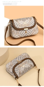 Detail of jacquard weave crossbody bag with gold hardware and brown leather trim