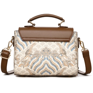 Elegant retro brown leather handbag with traditional Chinese embroidery and gold hardware