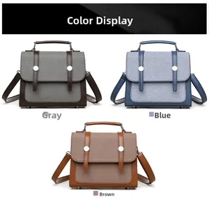 Dettaglio delle borse a tracolla alla moda nei colori grigio, blu e marrone in tessuto