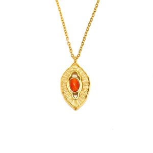 Vintage gold-plated stainless steel necklace with a sunburst leaf pendant and red stone