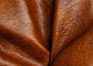 Macro di pelle marrone di alta qualità con trama morbida e grana naturale del materiale