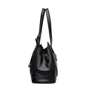 Classic black lychee pattern leather tote bag with large capacity in a side view