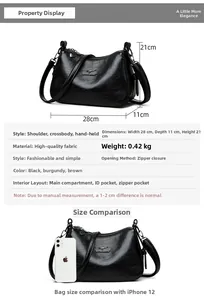 Size comparison of the black leather handbag next to a smartphone with detailed dimensions