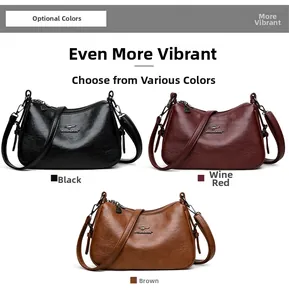 Close-up of soft leather handbags in black, burgundy, and brown with kangaroo gold logo