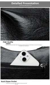 Detail view of premium black litchi grain leather and functional back zipper pocket