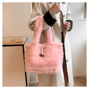 Pink faux fur tote bag detail featuring plush texture and wooden toggle closure