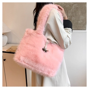 Pink faux fur tote bag detail with vintage toggle closure and soft plush texture