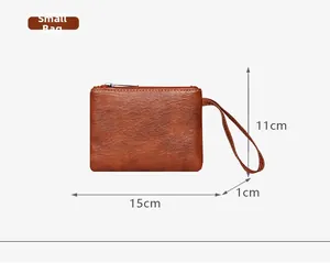 Detailed size specifications for the vintage brown zippered pouch with wrist strap