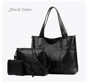 Detailed view of the 3-piece vintage black tote bag set including crossbody and mini pouch