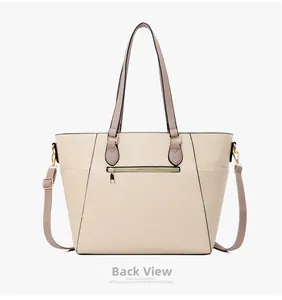 Dettaglio del retro della borsa tote che mostra la tasca con zip e la tracolla