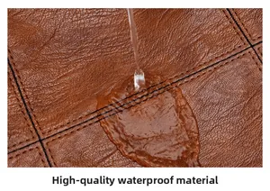 Detail of waterproof brown leather texture with water droplets on lychee grain surface