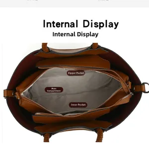 Top down view of brown tote bag showing main compartment with zipper pocket