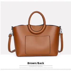 Rear view of brown litchi pattern tote bag showing back pocket and woven handle