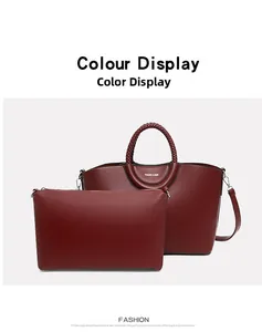 Close-up of burgundy tote bag set featuring lychee grain leather and woven handles