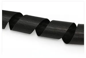 Close-up of high-density black woven shoulder strap showing texture and durable material