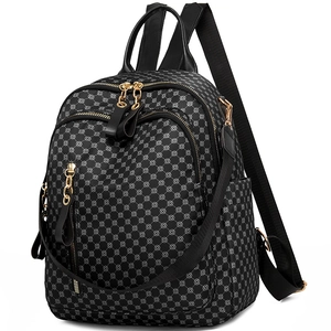 Waterproof nylon backpack for women featuring vintage print and gold hardware detail