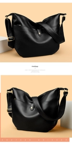 Close-up of black lychee grain leather hobo bag with elegant gold hardware accents