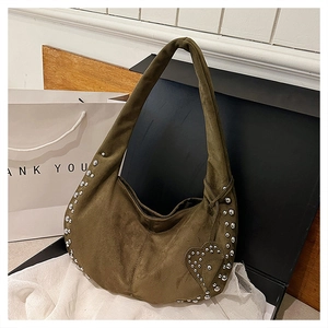 Olive green suede hobo bag detailing with silver studs and heart-shaped rivet patch