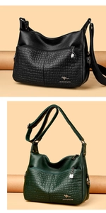 Detail showing crocodile-embossed leather and kangaroo metal logo on two stylish handbags