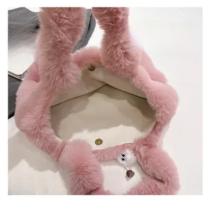 Detailed view of pink plush bucket bag interior with soft lining and magnetic closure