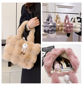 Internal view of large capacity plush bucket bag showing tablet and daily essentials
