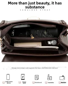 Top view of spacious multi-compartment interior for brown leather crossbody bag