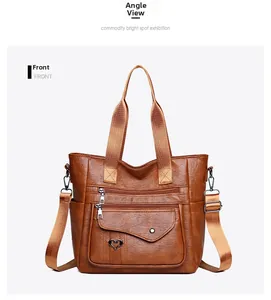 Front view of a brown soft PU leather tote bag with multiple zippers and heart-shaped buckle
